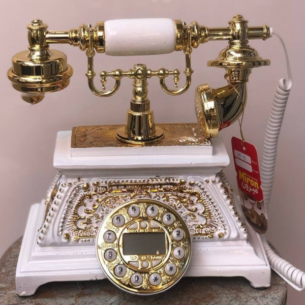 تلفن رومیزی سلطنتی میرون مدل 135، تلفن رومیزی سلطنتی دارای شناسه تماس گیرنده و شماره گیر دکمه ای، رنگ سفید طلایی