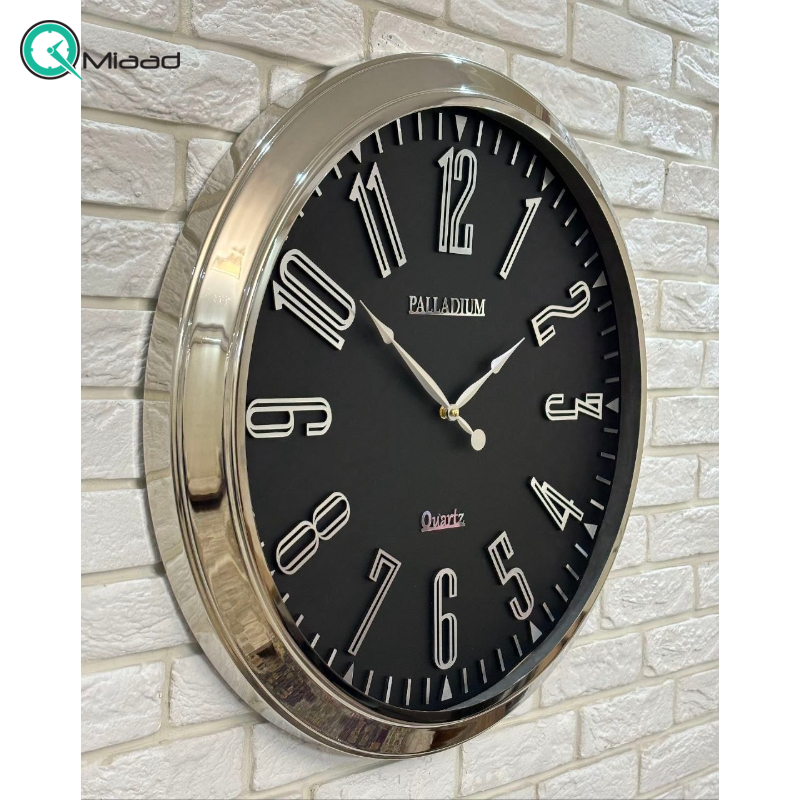 ساعت دیواری فلزی پالادیوم مدل 501، ساعت دیواری سایز 70 با فونت ساده و خوانا اعداد، ساعت دیواری شیک و متفاوت آبکاری شده با فریم فلزی، رنگ نقره ای مشکی قیمت ساعت دیواری