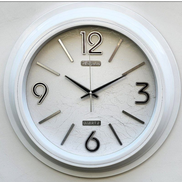 ساعت دیواری پرشین مدل 501، ساعت دیواری دو زمانه با تنوع رنگی و متریال پلاستیک، دارای موتور روانگرد و اعداد برجسته آبکاری شده لاتین، سایز 55، رنگ سفید