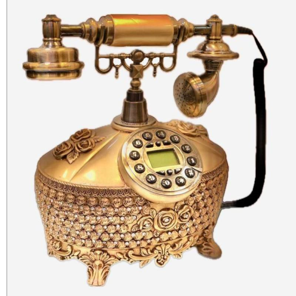 تلفن سلطنتی رومیزی رایکا مدل 340، تلفن سلطنتی با طراحی طرح نقش برجسته روی بدنه تلفن، شماره گیر دکمه ای و دارای کالر آیدی، دکوری شیک و جذاب مناسب منزل و محل کار| رنگ طلایی
