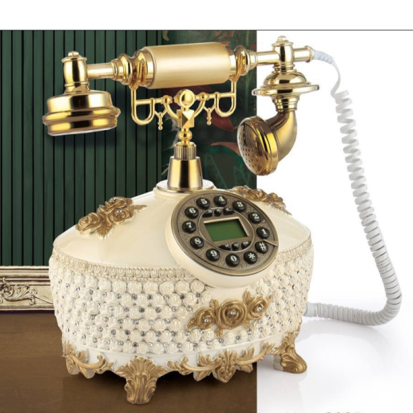 تلفن سلطنتی رومیزی رایکا مدل 340، تلفن سلطنتی با طراحی طرح نقش برجسته روی بدنه تلفن، شماره گیر دکمه ای و دارای کالر آیدی، دکوری شیک و جذاب مناسب منزل و محل کار| رنگ سفید طلایی