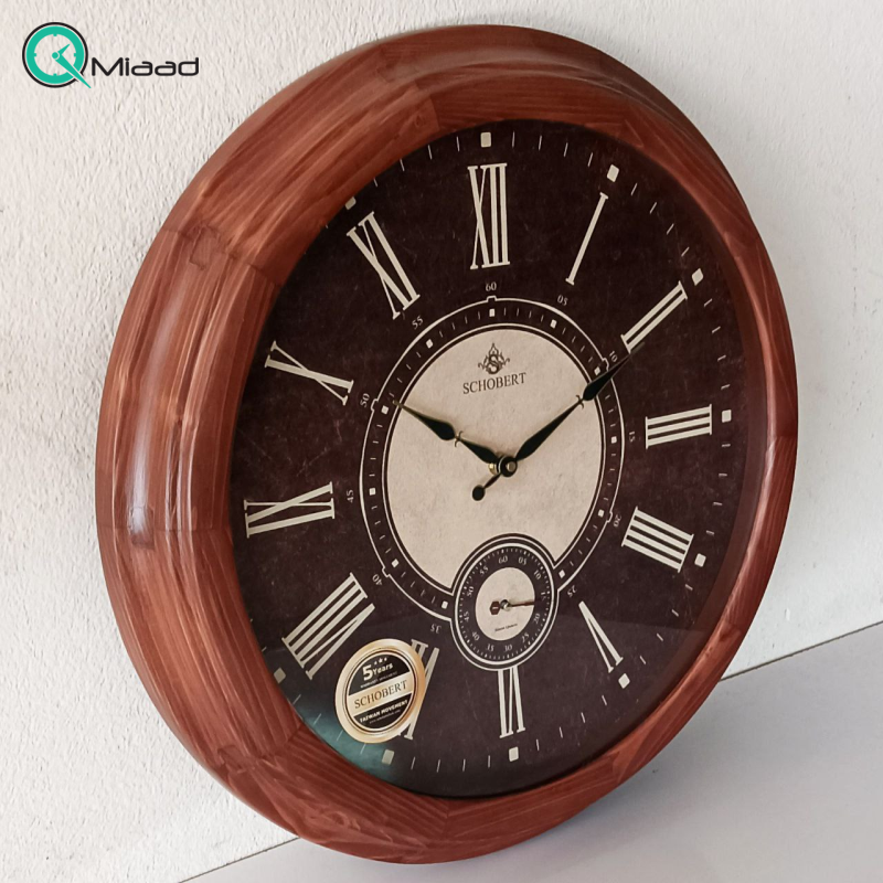 ساعت دیواری شوبرت مدل 1501، ساعت دیواری با فریم چوب طبیعی، سایز 50 با اعداد و عقربه های قهوه ای ساعت دیواری فلزی