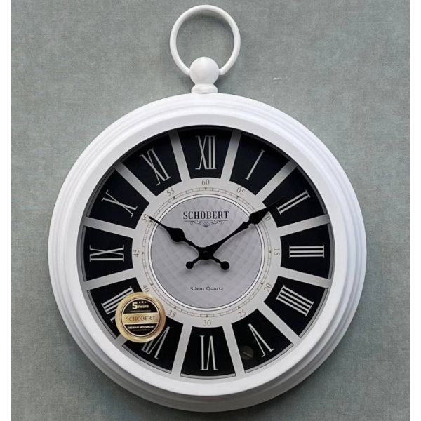 ساعت دیواری فلزی شوبرت مدل 5138B، ساعت دیواری مدرن و بی نظیر با طراحی ساعت های جیبی، دارای اعداد رومی کلاسیک، رنگ بدنه سفید و جزییات مشکی