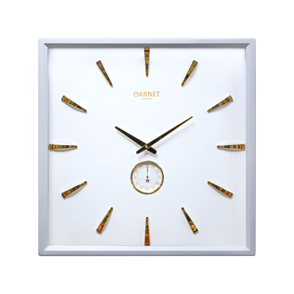 ساعت دیواری شوبرت، ساعت دیواری شکیل و بسیار خاص با صفحه سفید، دارای ثانیه شمار مستقل، متریال پلاستیک بدنه، سایز 60 با اعداد و عقربه های طلایی رنگ، مدل 5213 گارنت