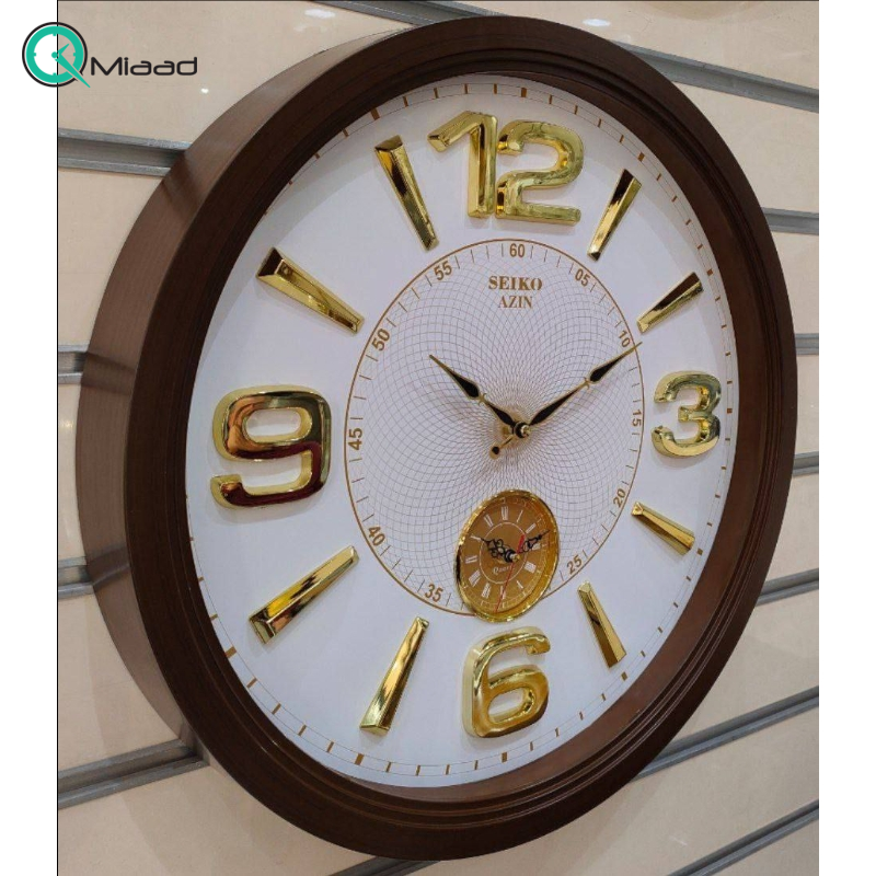 ساعت دیواری سیکو آذین مدل 120، ساعت دیواری سایز 55 پلاستیکی طرح کلاسیک با صفحه چوبی و اعداد برجسته مولتی، دارای موتور ثانیه شمار مستقل، رنگ قهوه ای سفید  ساعت دیواری کلاسیک