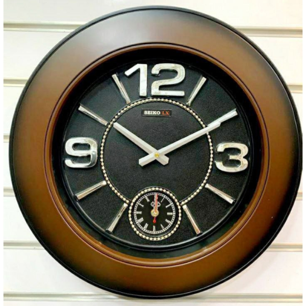 ساعت دیواری سیکو LX، ساعت دیواری دو زمانه با تنوع رنگی، دارای موتور روانگرد، سایز 50، رنگ قهوه ای نقره ای