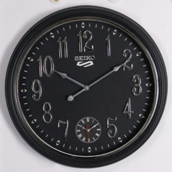 ساعت دیواری سیکو S، ساعت دیواری دو زمانه با تنوع رنگی، دارای موتور روانگرد، سایز 55، رنگ مشکی