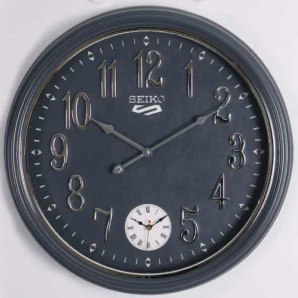ساعت دیواری سیکو S، ساعت دیواری دو زمانه با تنوع رنگی، دارای موتور روانگرد، سایز 55، رنگ طوسی