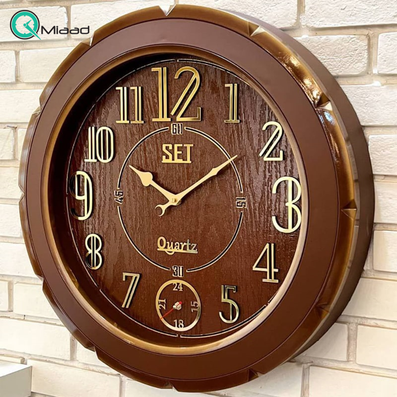 ساعت دیواری ست Set، ساعت دیواری سوپر براق با صفحه چوبی، دارای موتور آرامگرد و ثانیه شمار مستقل، اعداد لاتین، سایز 60 سانتی متر، مدل S20، رنگ قهوه ای قیمت ساعت دیواری