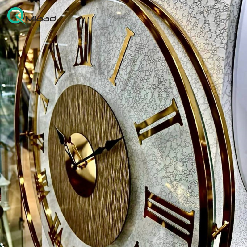 ساعت دیواری تسو مدل 1001، ساعت دیواری مدرن و ساده فلزی قطر 60 سانت با موتور آرامگرد، رنگ طلایی با آبکاری فورتیک قیمت ساعت دیواری