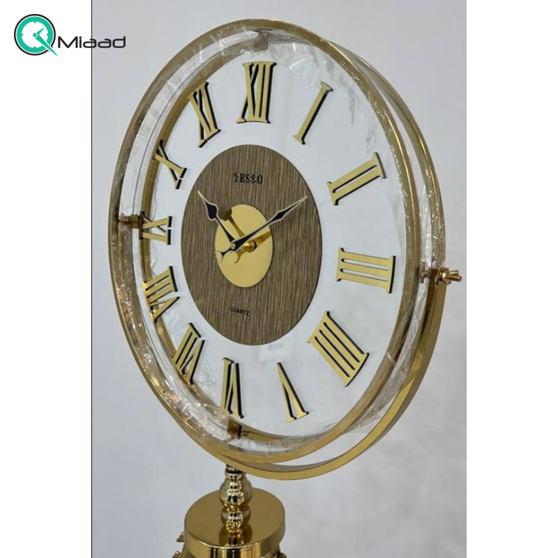 ساعت ایستاده تسو مدل 1007، ساعت سالنی تمام فلزی با آبکاری فورتیک، دارای سه پایه مخصوص، موتور آرامگرد تایوانی و دارای دو رنگ، رنگ طلایی  ساعت کنارسالنی