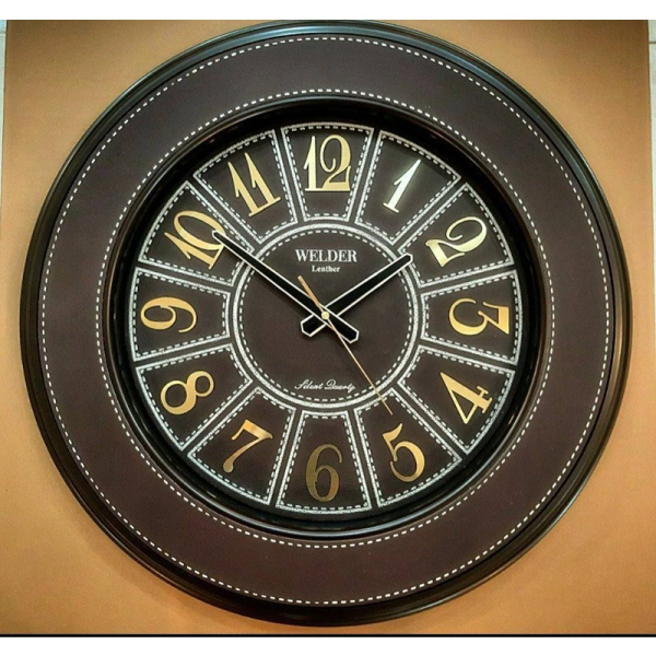 ساعت دیواری ولدر Welder مدل 308، ساعت دیواری سایز 55 با عقرب های متفاوت، دارای رنگ بندی و صفحه چرمی، فونت لاتین اعداد، دارای موتور درجه یک میتسو، رنگ مشکی