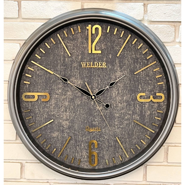 ساعت دیواری ولدر Welder مدل 639، ساعت دیواری سایز 60 با عقرب های متفاوت، صفحه کاغذ دیواری ترک، دارای رنگ بندی، شماره برجسته مولتی، دارای موتور درجه یک میتسو، رنگ بژ طلایی
