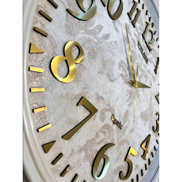 ساعت دیواری ولدر Welder مدل 7011، ساعت دیواری سایز 70 با صفحه کاغذ دیواری ترک، دارای رنگ بندی، شماره برجسته مولتی با فونت لاتین، دارای موتور درجه یک میتسو، رنگ سفید